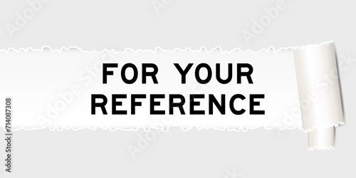Ripped gray paper background that have word for your reference under torn part