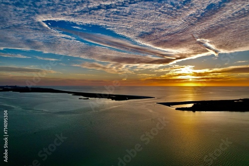 defaultThe drone photos of a beautiful sunset at Dunedin Causeway Beach, Tampa Bay, Florida photo