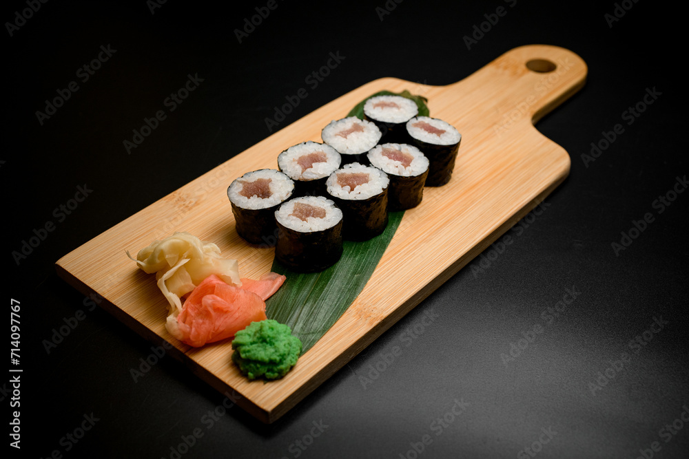 Delightful sushi set display on wood Delightful sushi set display on wood