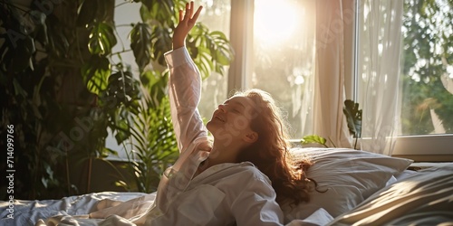 A woman wakes up content and relaxed in her bedroom after a restful night's sleep, with a peaceful smile and stretching.