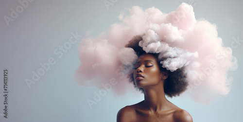 Beautiful black woman with clouds on her head.	