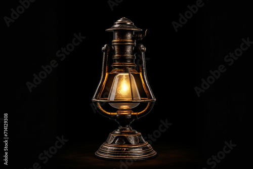 Old lamp on black background