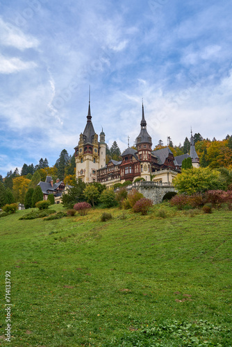 Peles Castle in Romania on a cloudy autumn day