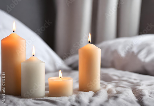 Air reed freshener and burning candles on bed indoors  space for text.AI generated