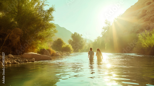 Fotografija The biblical scene from the Gospels where John the Baptist baptizes Jesus in the Jordan River