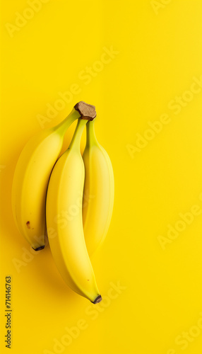 Healthy bunch of fresh yellow bananas on a white background, perfect for a nutritious and delicious snack
