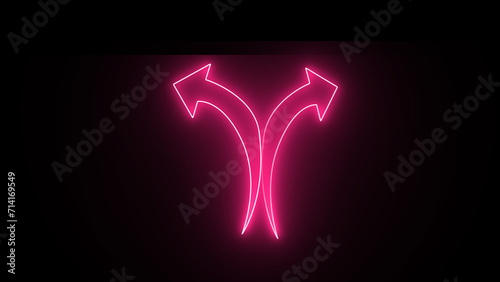 Fototapeta Naklejka Na Ścianę i Meble -  Neon color arrow points to the bothside. An arrow in the darkness that glows. Neon arrow sign.