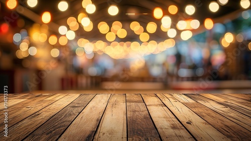 Empty wooden brown table top with blur bokeh background of cafe