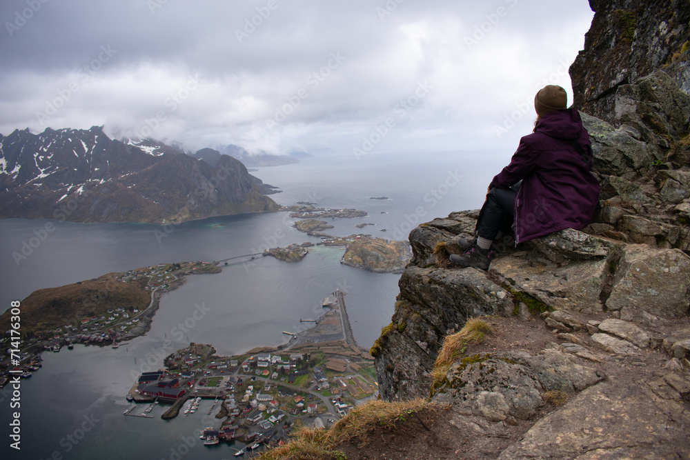 Reine, Lofoten, Norway. Arieal view of the small fishing village know from commercial fishing and dried air-dried cod Reine, Lofoten, Norway. Arieal view of the small fishing village know from commercial fishing and dried air-dried cod