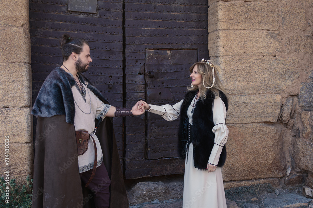 Medieval Knight and Lady Greeting at Castle Entrance Medieval Knight and Lady Greeting at Castle Entrance