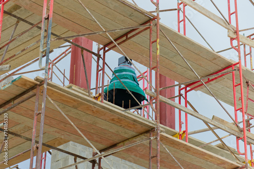 Church Construction of bell tower and parish hall.