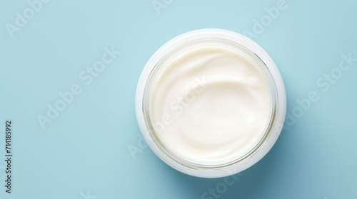 White Natural Hypoallergenic Eco Cream for Face or Body on Minimalistic Blue Background AI Generated photo