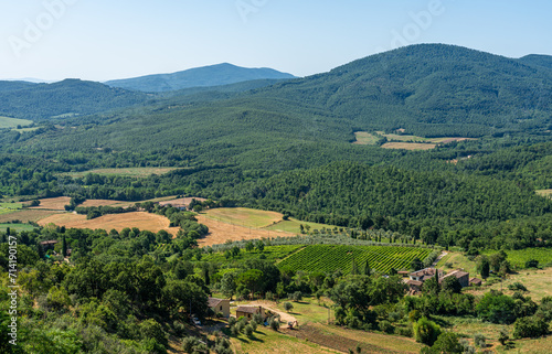 Panoramic view from the village of Chiusdino on a sunny summer morning. Province of Siena, Tuscany, Italy.