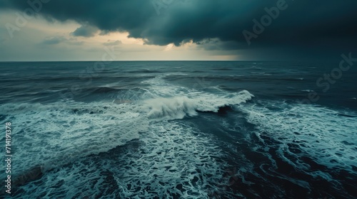 Aerial perspective of stormy sea at dusk  dark clouds  rough waters