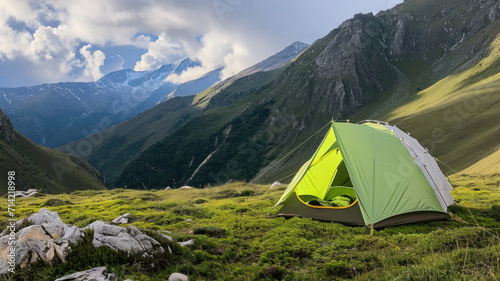 A tent pitched up in the middle of the mountains