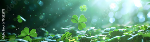 happy new year banner with four-leaf clover as a lucky charm on blurred background	