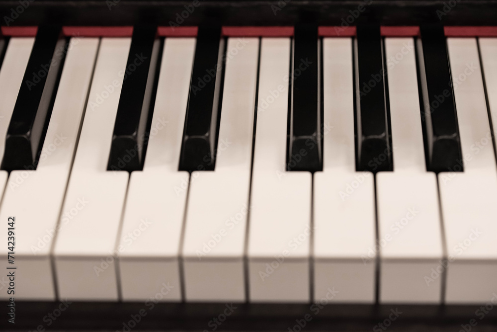 Classic Piano Keys, Traditional Black and White Keyboard Close up with selective focus Classic Piano Keys, Traditional Black and White Keyboard Close up with selective focus