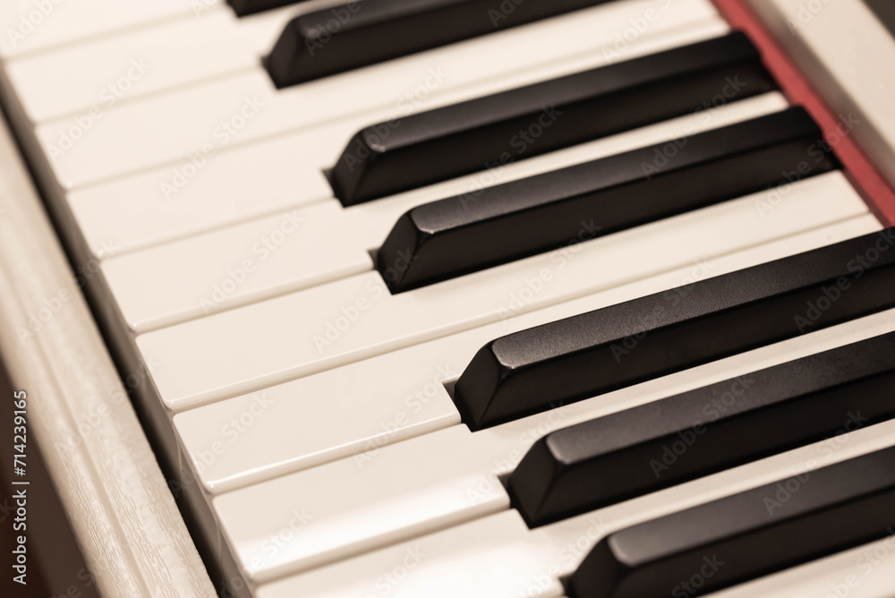 Classic Piano Keys, Traditional Black and White Keyboard Close up with selective focus Classic Piano Keys, Traditional Black and White Keyboard Close up with selective focus