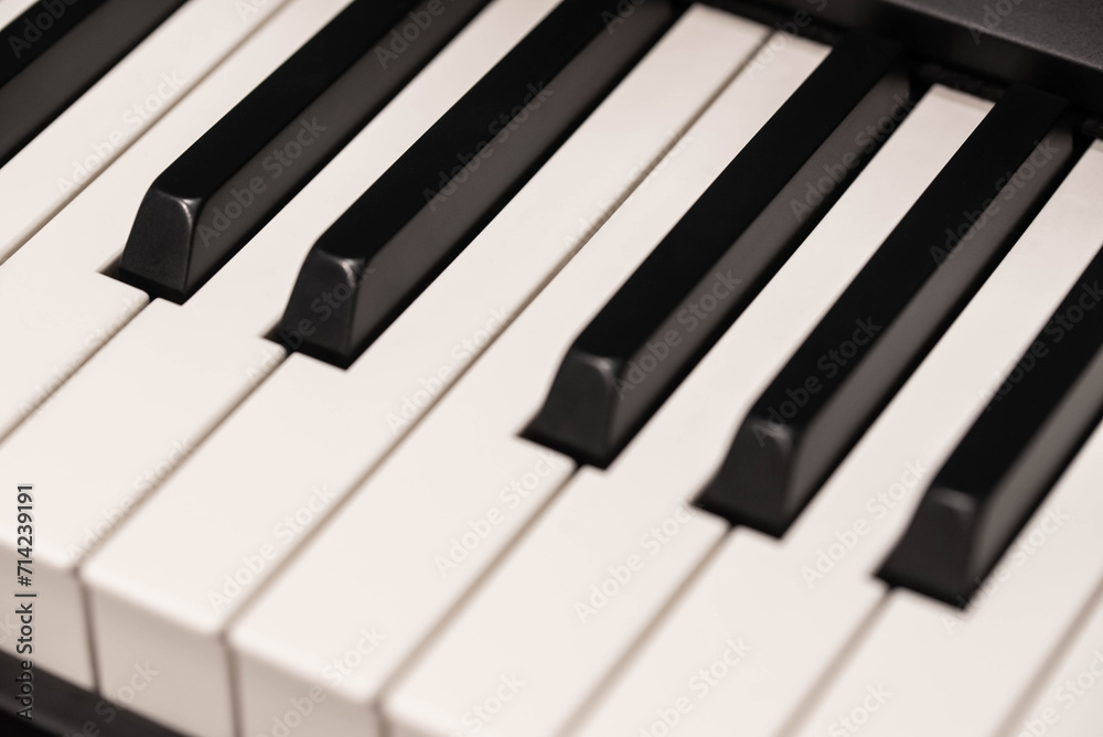 Classic Piano Keys, Traditional Black and White Keyboard Close up with selective focus Classic Piano Keys, Traditional Black and White Keyboard Close up with selective focus