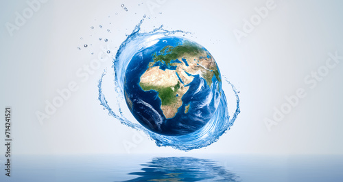 This creative image shows a splash of blue water forming the shape of a globe, representing the importance of water for life on Earth. The image was created for World Water Day, an annual event held