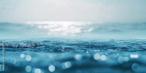 Abstract blur light on sea and ocean, clear water close up colorful background. photo