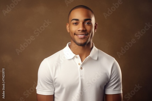 Happy African American man in studio portrait.