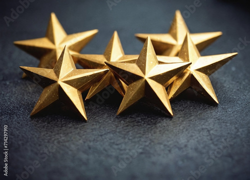 Macro shot of golden stars on a textured dark backdrop, highlighting the concept of excellence and prestige