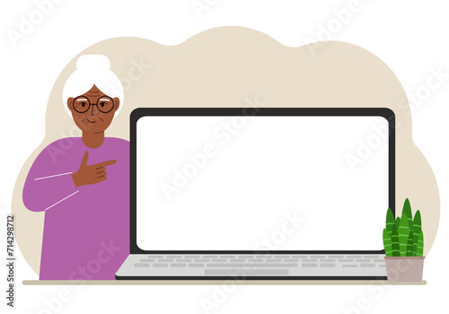 A woman next to a large laptop with plenty of space for text.