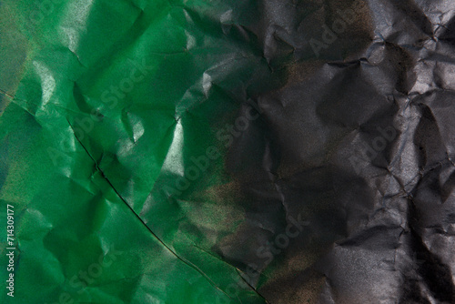 green color and black color on crumpled kraft paper
