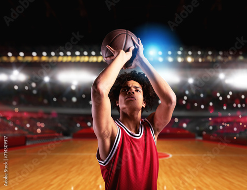 Basketball player ready to shoot the ball during a match © alphaspirit