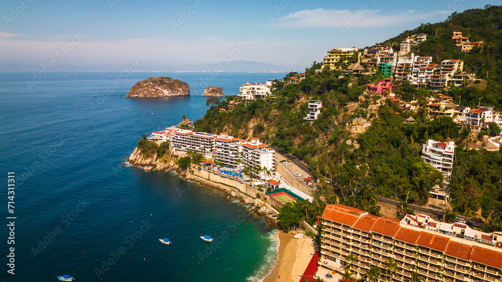Naklejka premium Aerial of Mismaloya beach resort waterfront town in Nayarit coastline riviera close to Puerto Vallarta surf spot holiday destination