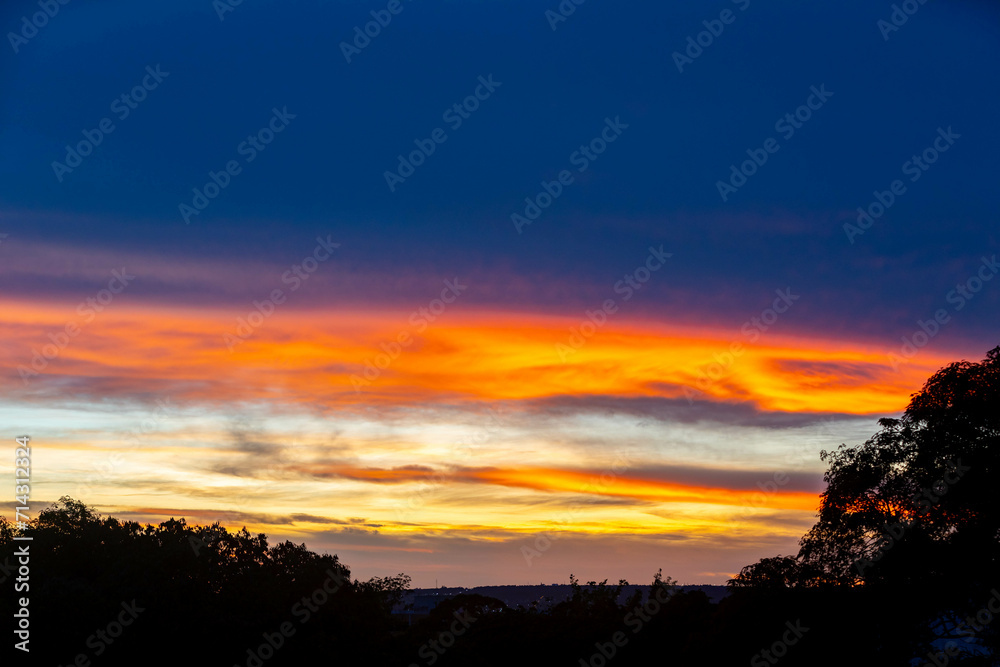 Idyllic multicolored sky at dawn in a panoramic setting