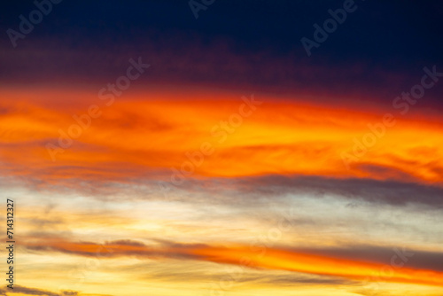 Idyllic multicolored sky at dawn in a panoramic setting © Adilson