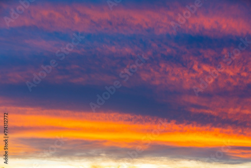 Idyllic multicolored sky at dawn in a panoramic setting © Adilson