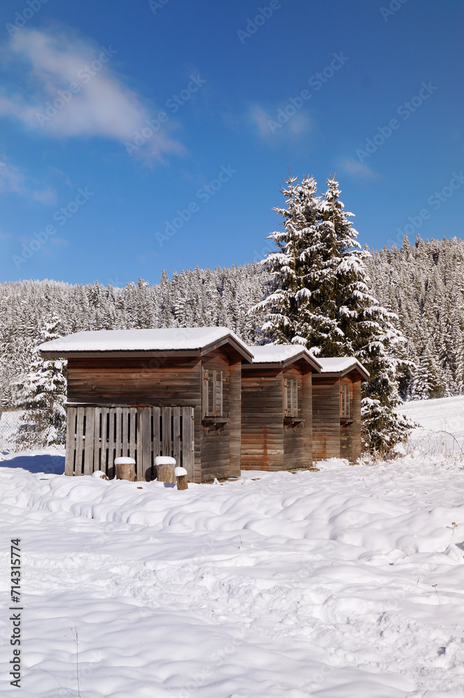 Small Wooden Cabins On The Mountain
