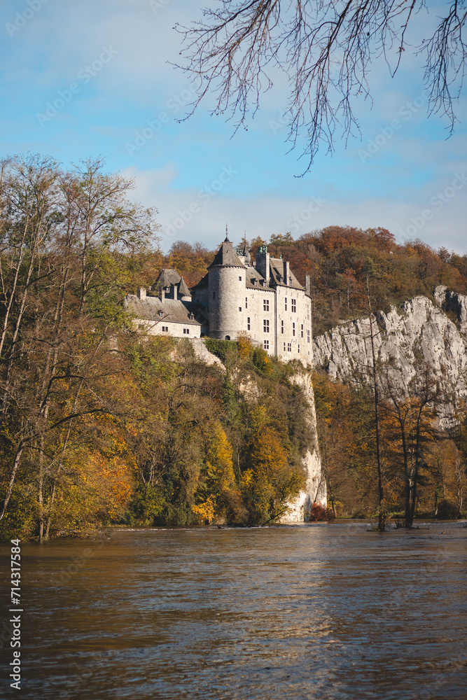 Medieval Walzin Castle on the banks of the River Lesse in the Wallonia region of southern Belgium. Gothic Revival castle stands on a steep rock in the province Namur