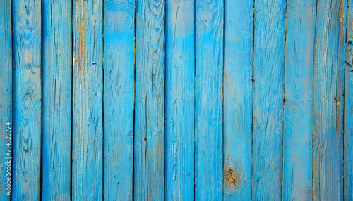light blue old wooden background of boards old worn cracked paint bright saturated color © Heaven