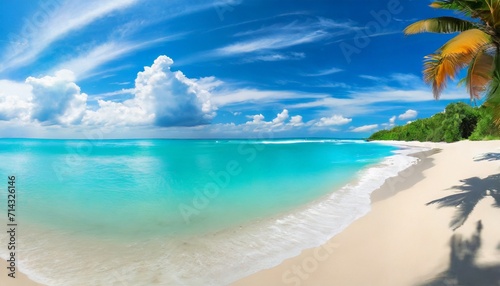 beautiful beach with white sand turquoise ocean water and blue sky with clouds in sunny day panoramic view natural background for summer vacation