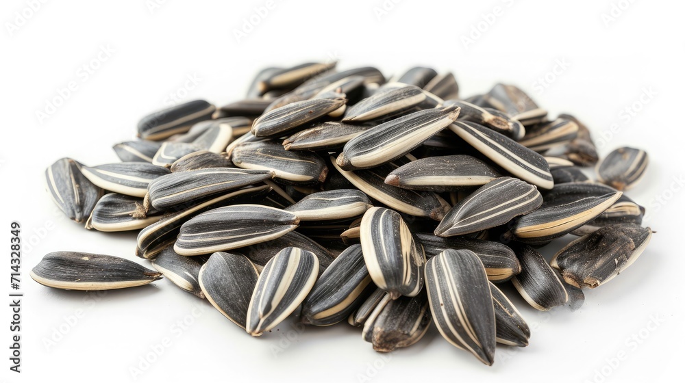 Sunflower seeds on isolated white background. Sunflower seeds on isolated white background.