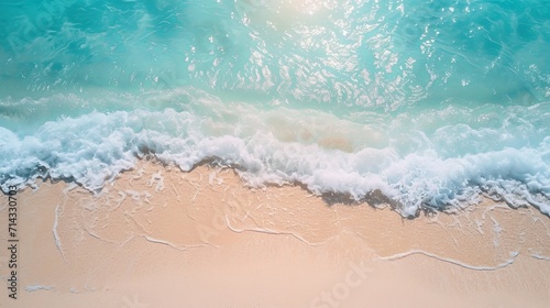 Abstract sand beach from above with light blue transparent water wave and sun lights, summer vacation background concept banner with copy space, natural beauty spa outdoors photo