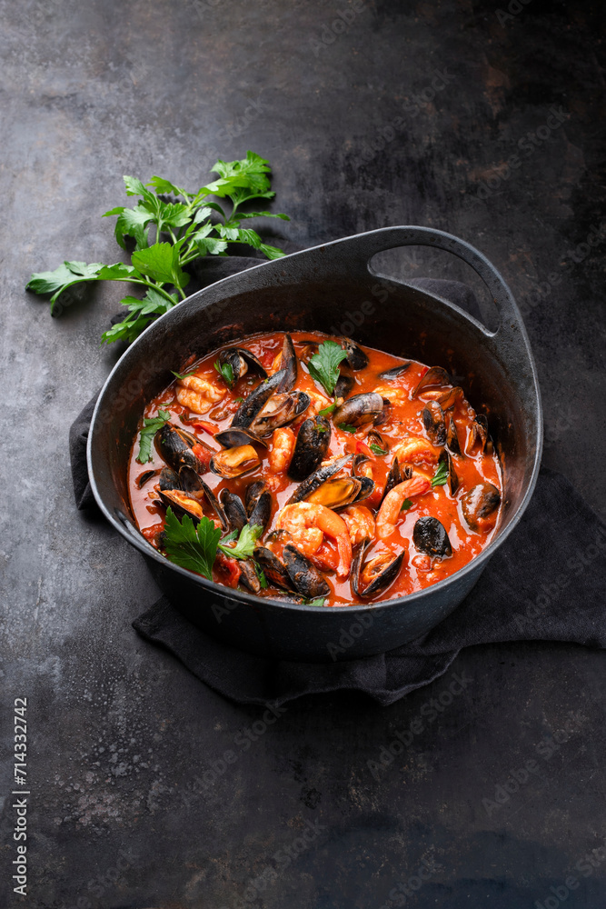 Traditional Creole cajun court bouillon with mussels and prawn gumbo chowder stew as close-up in a pot Traditional Creole cajun court bouillon with mussels and prawn gumbo chowder stew as close-up in a pot
