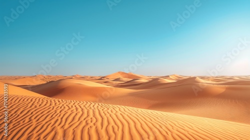  a group of sand dunes with a bright blue sky in the background and a bright sun in the middle of the sky in the middle of the middle of the desert.