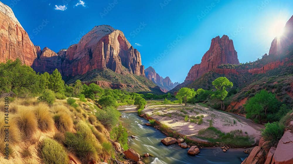 Zion National Park with the Virgin River winding through towering red rock formations, under a clear blue sky