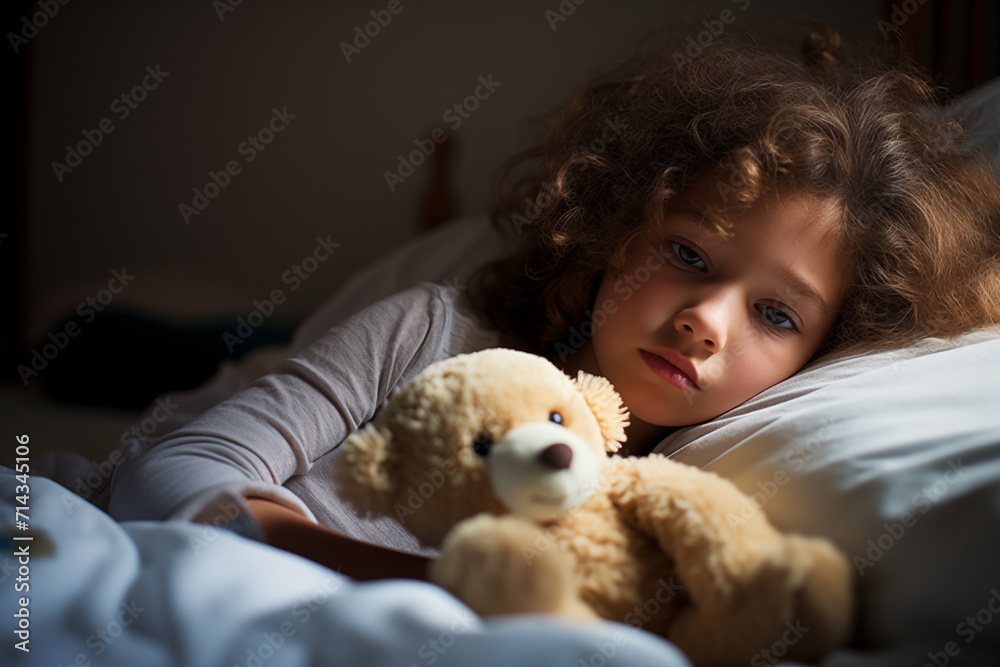 selective focus on llittle girl sick in bed with teddy bear selective focus on llittle girl sick in bed with teddy bear