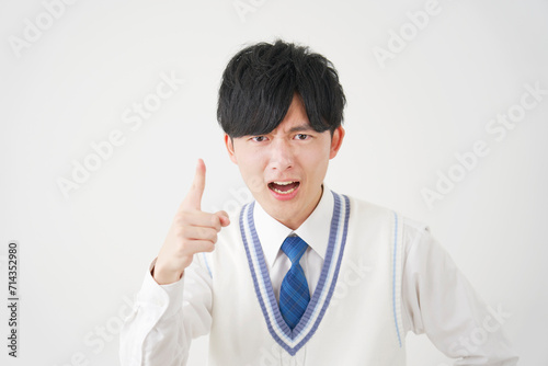Foto 文句を言う男子高校生　白背景