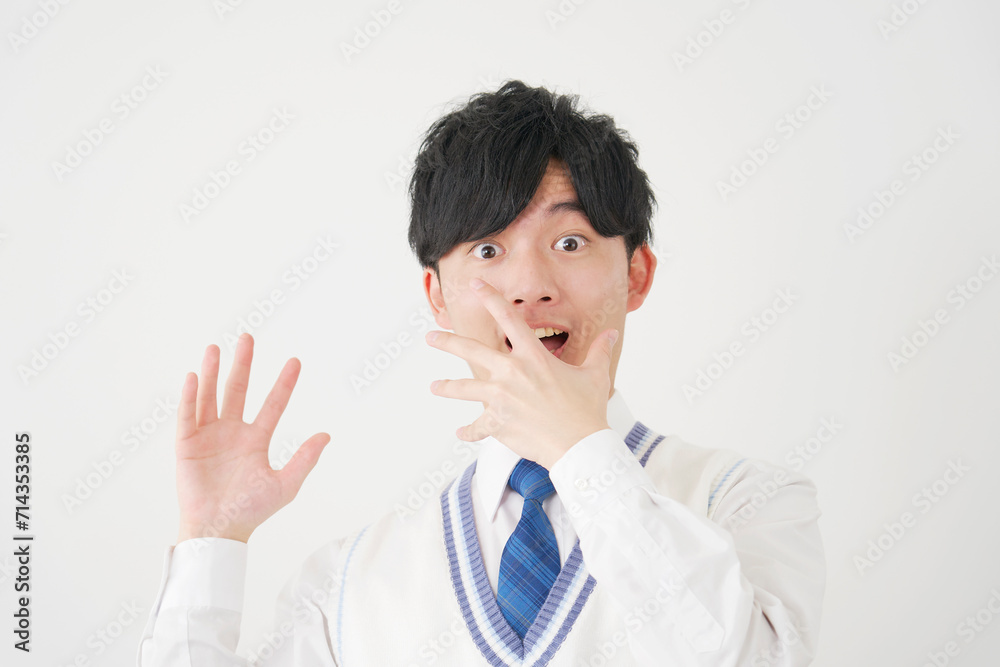 驚く男子高校生 白背景 驚く男子高校生 白背景