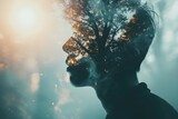 A creative double exposure image that merges a human profile with a forest landscape