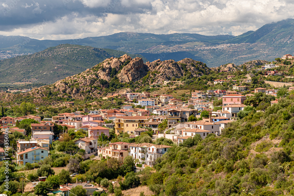Panoramic summer view Santa Maria Navarrese, small touristic town in east Sardinia, with inner hills in the background