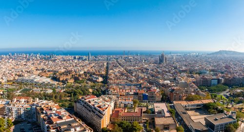 Aerial view of Barcelona City Skyline at sunset. Residential famous urban grid of Catalonia. Beautiful panorama of Barcelona. © ingusk