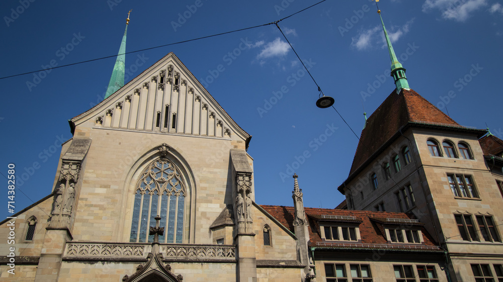 Obraz premium Church With Two Steeples and Clock Tower